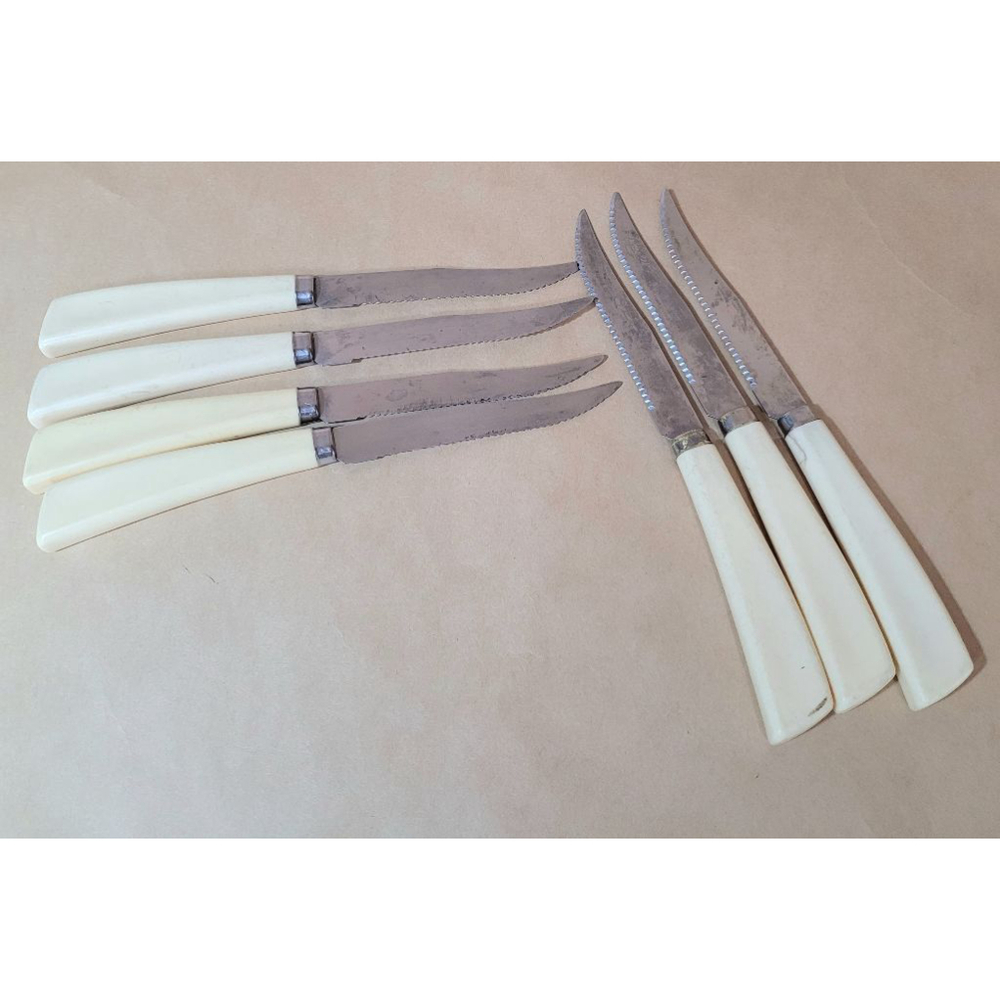 Set of 7 Vintage Quikut Steak Knives